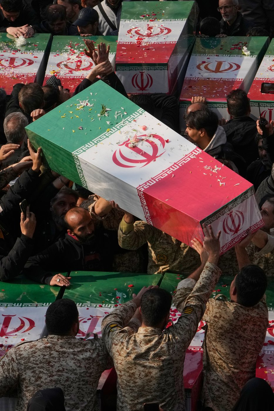 Photos show mourners in Tehran honoring the unknown soldiers killed in the 1980's Iran-Iraq war | iNFOnews.ca