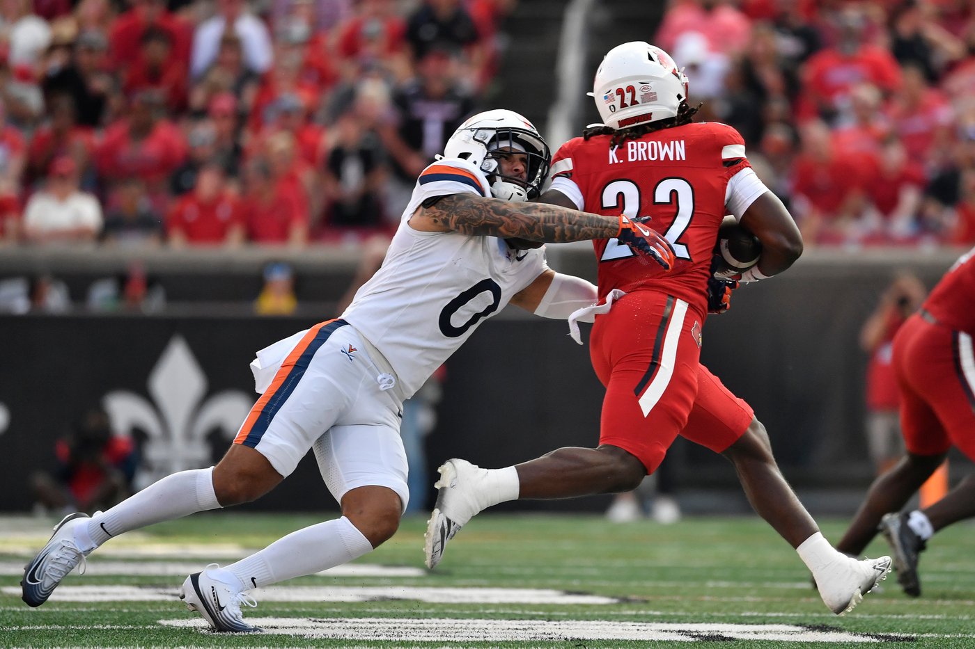 Taylor's OT run lifts No. 24 Virginia to a 30-27 victory over Louisville | iNFOnews.ca