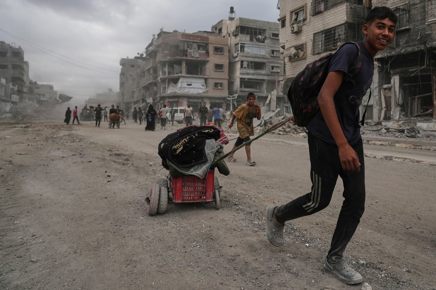 The Latest: Palestinians journey back home as aid convoys start to enter Gaza | iNFOnews.ca