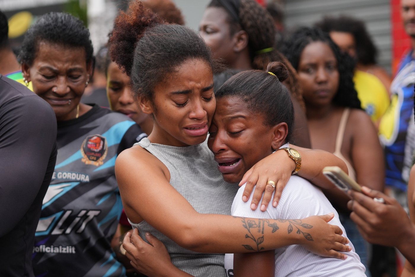 Anguish in Rio: Photos show bodies lining the streets after massive police raid | iNFOnews.ca