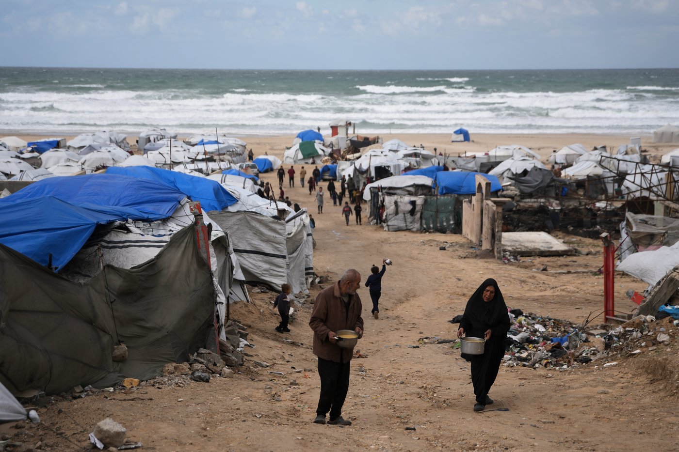 Winter rain floods Gaza camps as Netanyahu heads for US meeting | iNFOnews.ca Winter rain floods Gaza camps as Netanyahu heads for US meeting | iNFOnews.ca