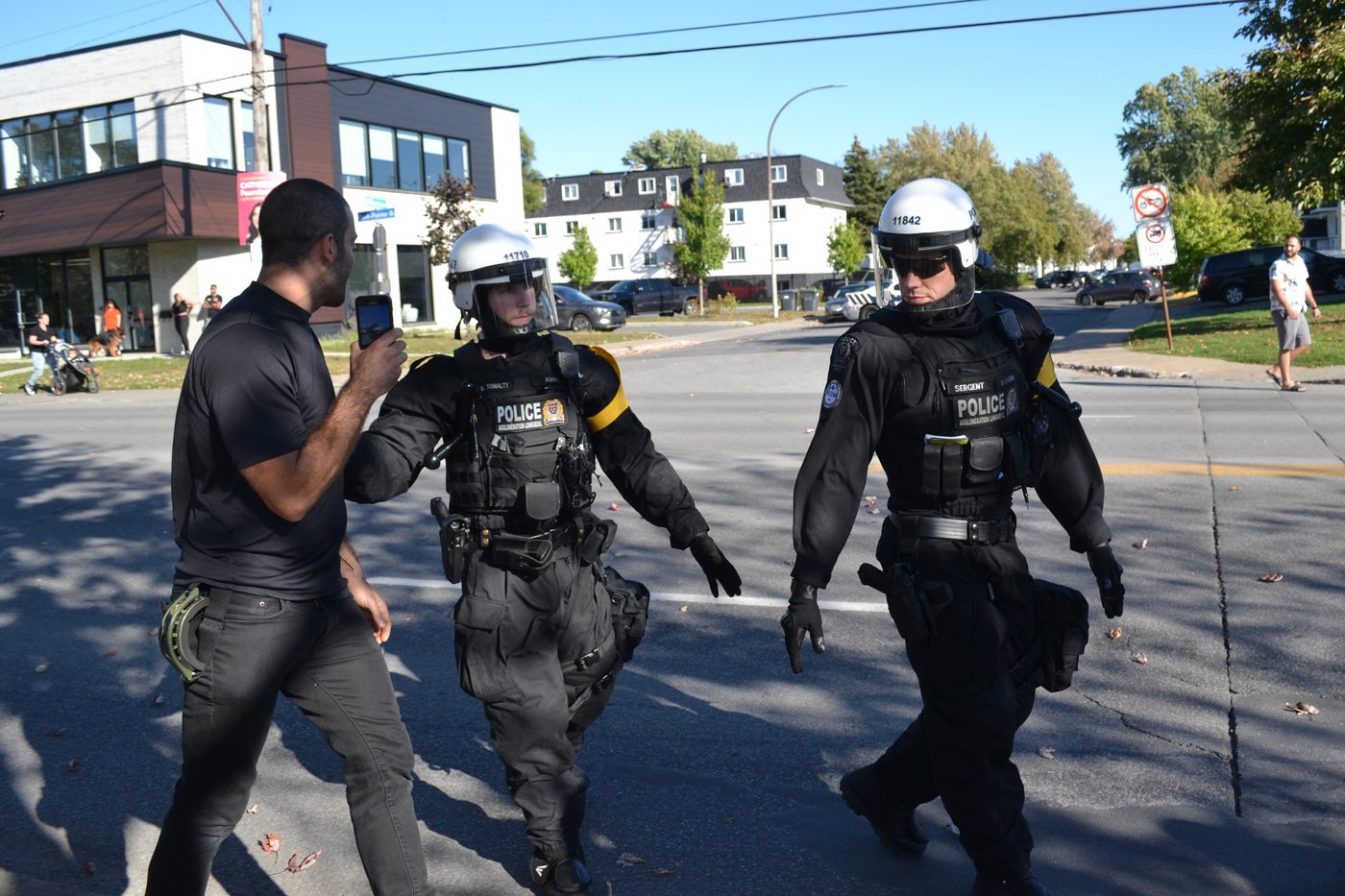 Protesters demand body cameras after fatal shooting of 15-year-old Nooran Rezayi | iNFOnews.ca