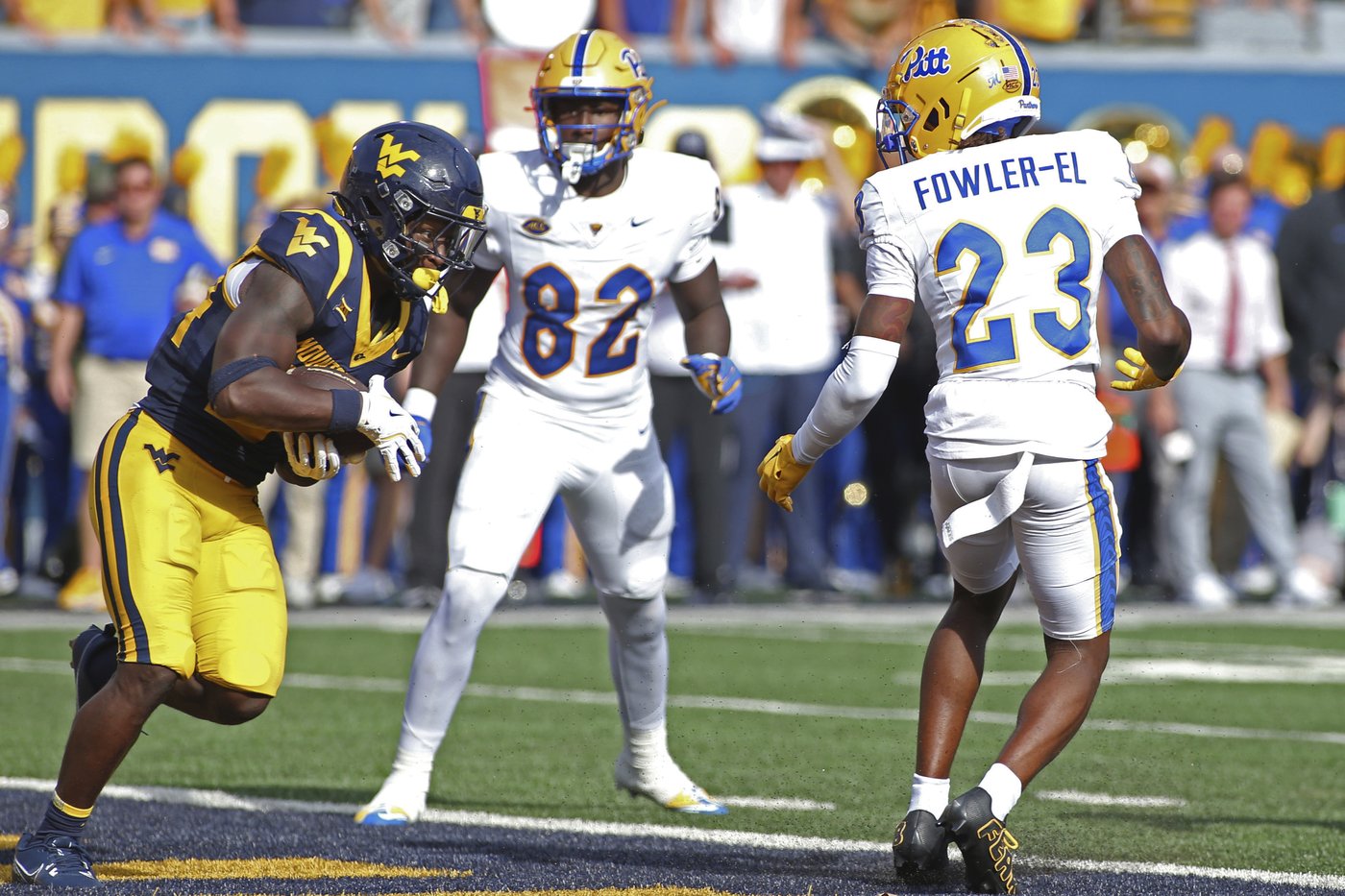 Edwards' short TD run in overtime leads West Virginia over Pittsburgh 31-24 in the Backyard Brawl | iNFOnews.ca