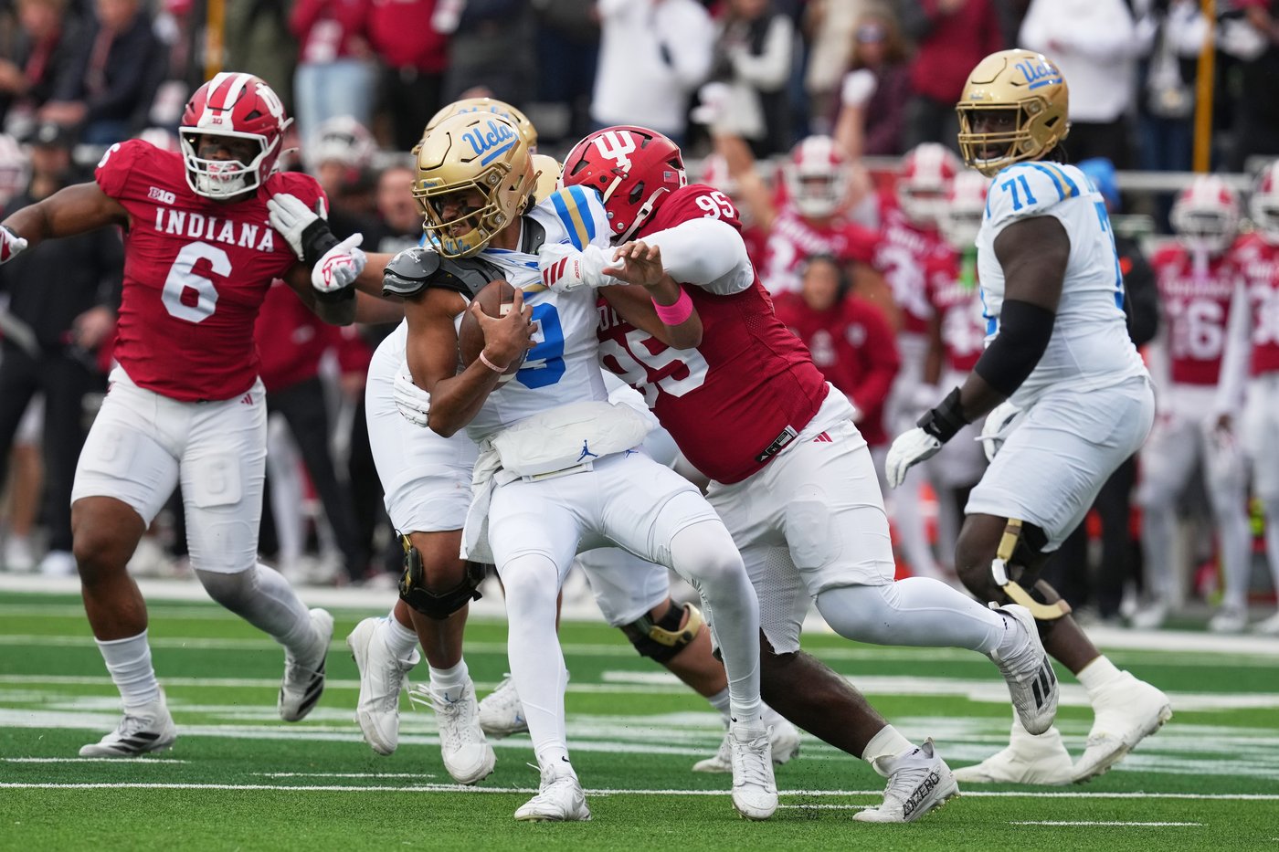 Aiden Fisher's early interception, Mendoza brothers' TD runs help No. 2 Indiana roll past UCLA 56-6 | iNFOnews.ca Aiden Fisher's early interception, Mendoza brothers' TD runs help No. 2 Indiana roll past UCLA 56-6 | iNFOnews.ca