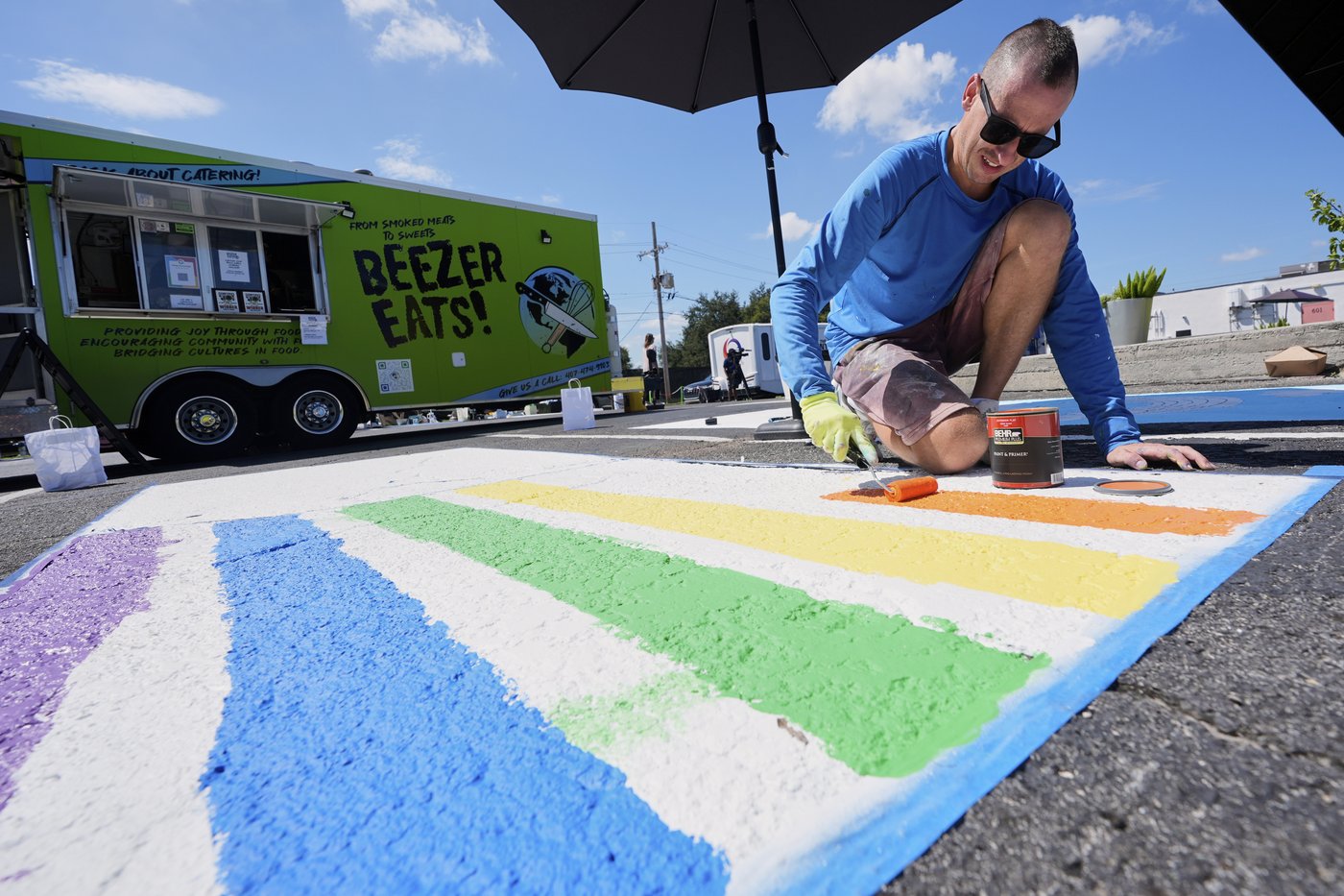 Parking spots used as colorful protest against Florida crackdown on rainbow crosswalks | iNFOnews.ca