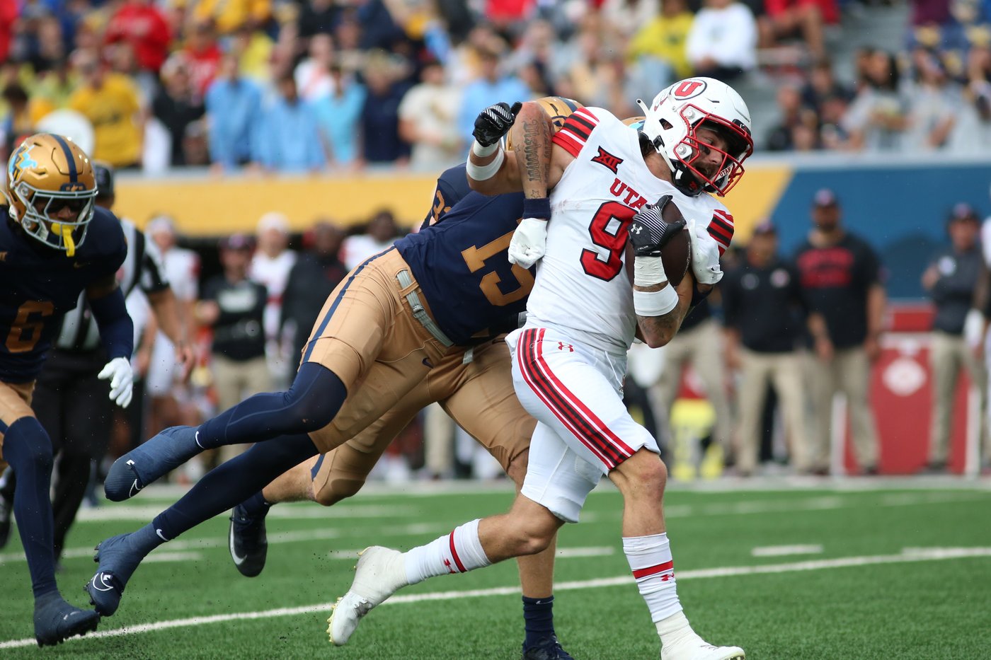 Dampier throws career-high 4 TD passes, runs for a score and Utah beats West Virginia 48-14 | iNFOnews.ca