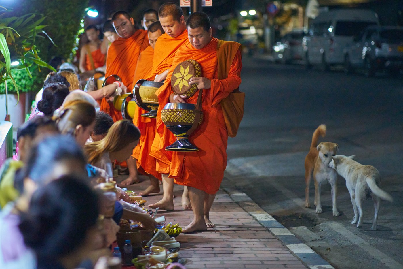 Photos of Buddhist monks in Laos praying in region littered with unexploded bombs | iNFOnews.ca