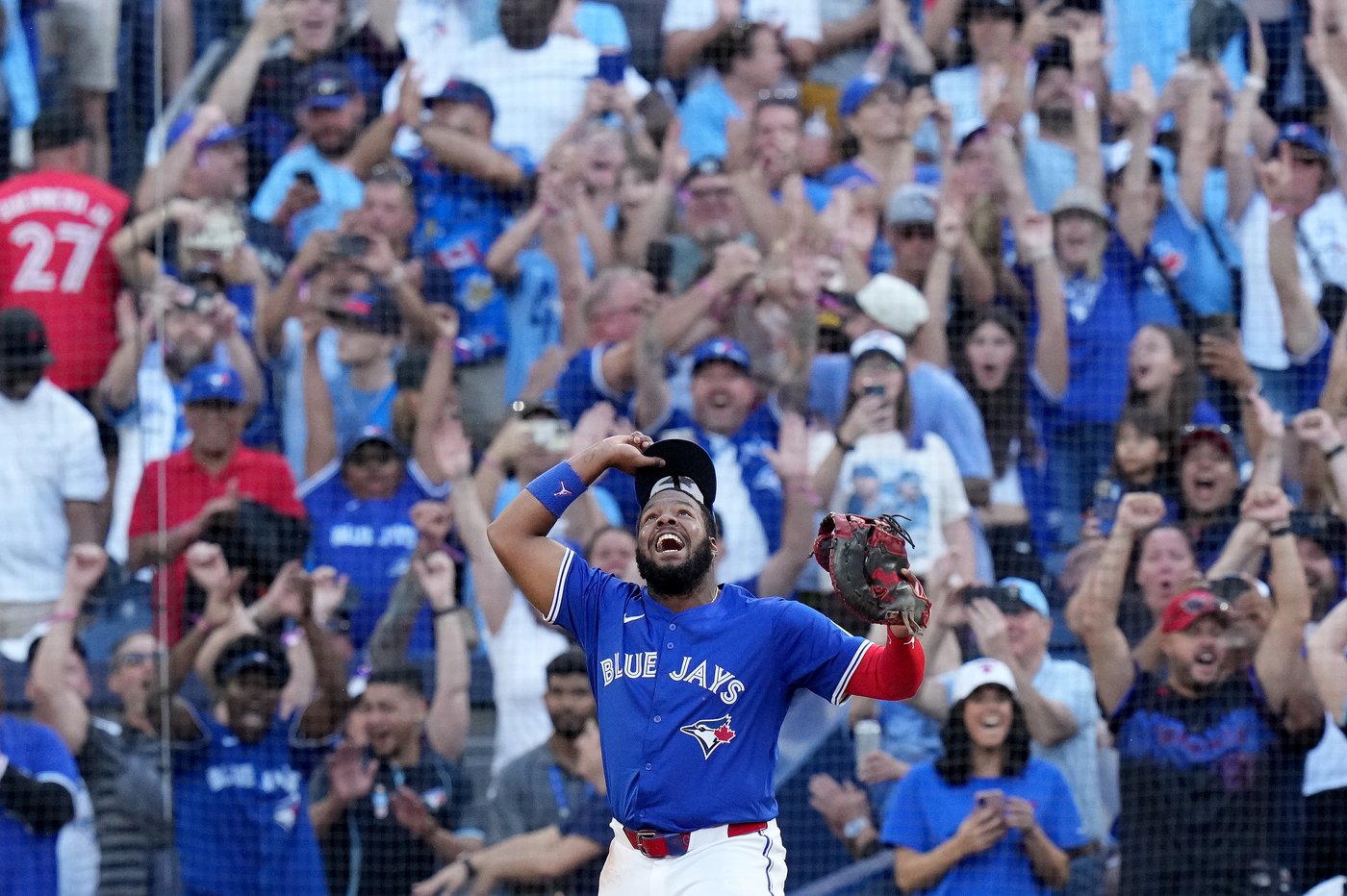 Kirk drives in six runs as Jays wallop Rays 13-4 to win division and earn playoff bye | iNFOnews.ca