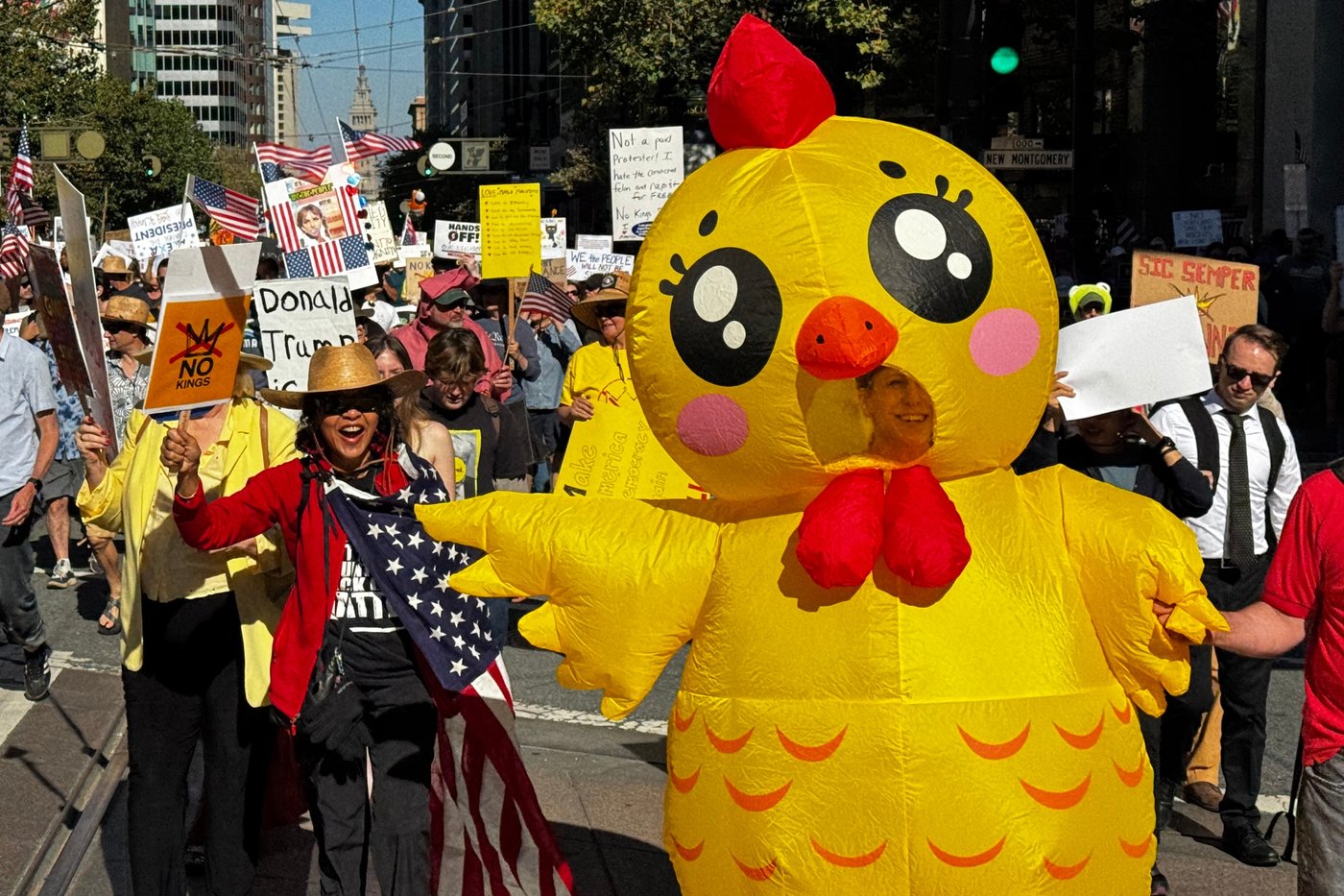 Inflatable costumes used to deflate tensions at rallies against Trump, in photos | iNFOnews.ca