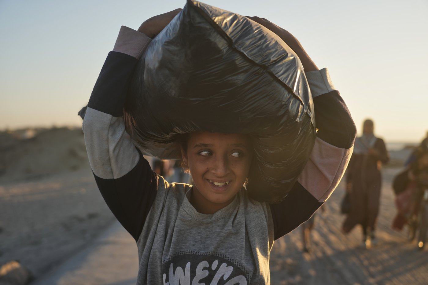 The Latest: Tens of thousands of Palestinians in Gaza return north as ceasefire takes effect | iNFOnews.ca
