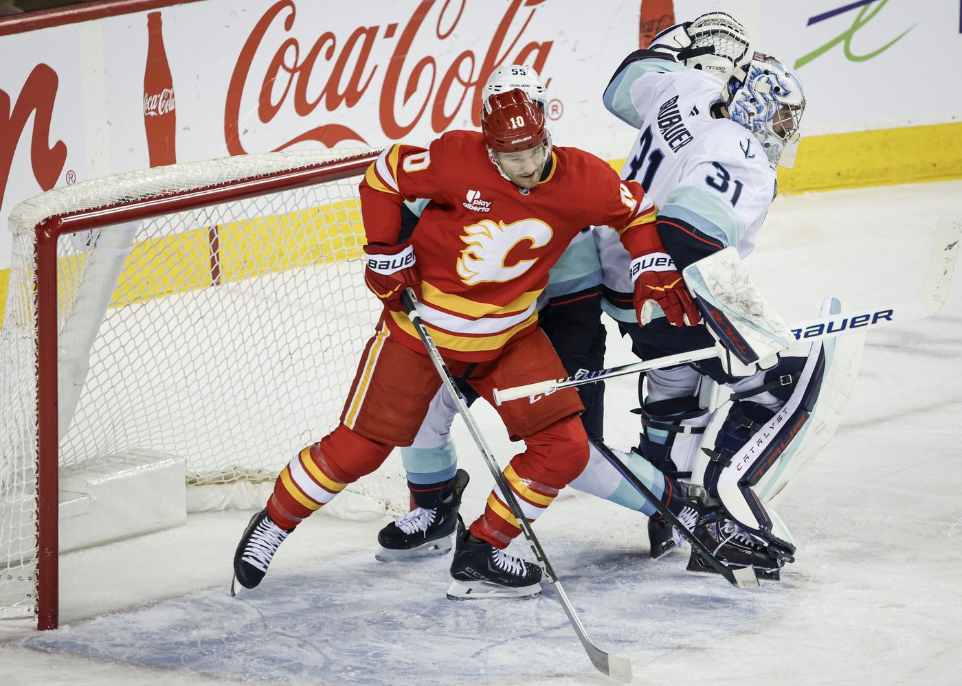 Surging Kraken score four times in third period to burn Flames 5-1 | iNFOnews.ca
