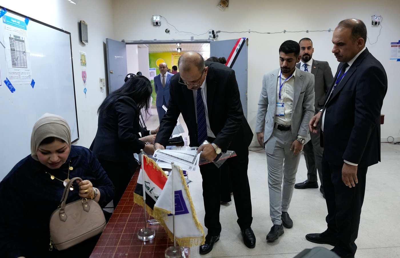 Iraqis vote in a parliamentary election marked by tight security and a major political boycott | iNFOnews.ca
