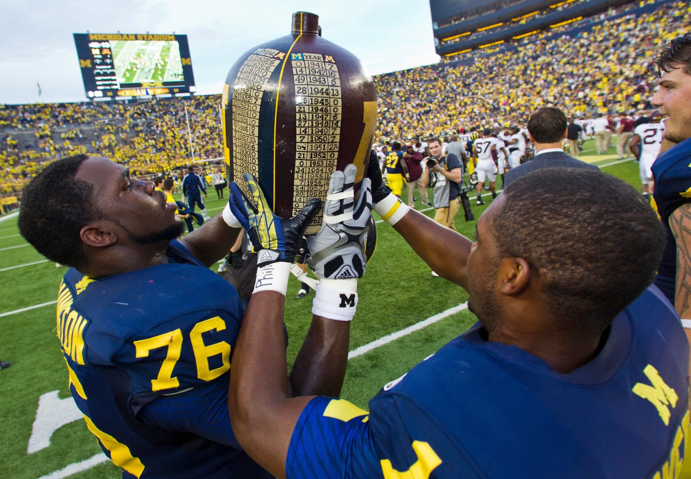 What do an axe, a bucket and a cannon have in common? Meet the rivalry trophies of college football | iNFOnews.ca