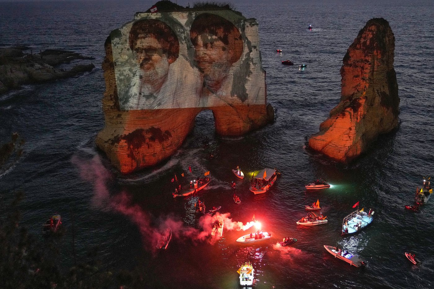 Hezbollah defies Lebanon PM's ban to honor fallen leaders with coastal light show | iNFOnews.ca