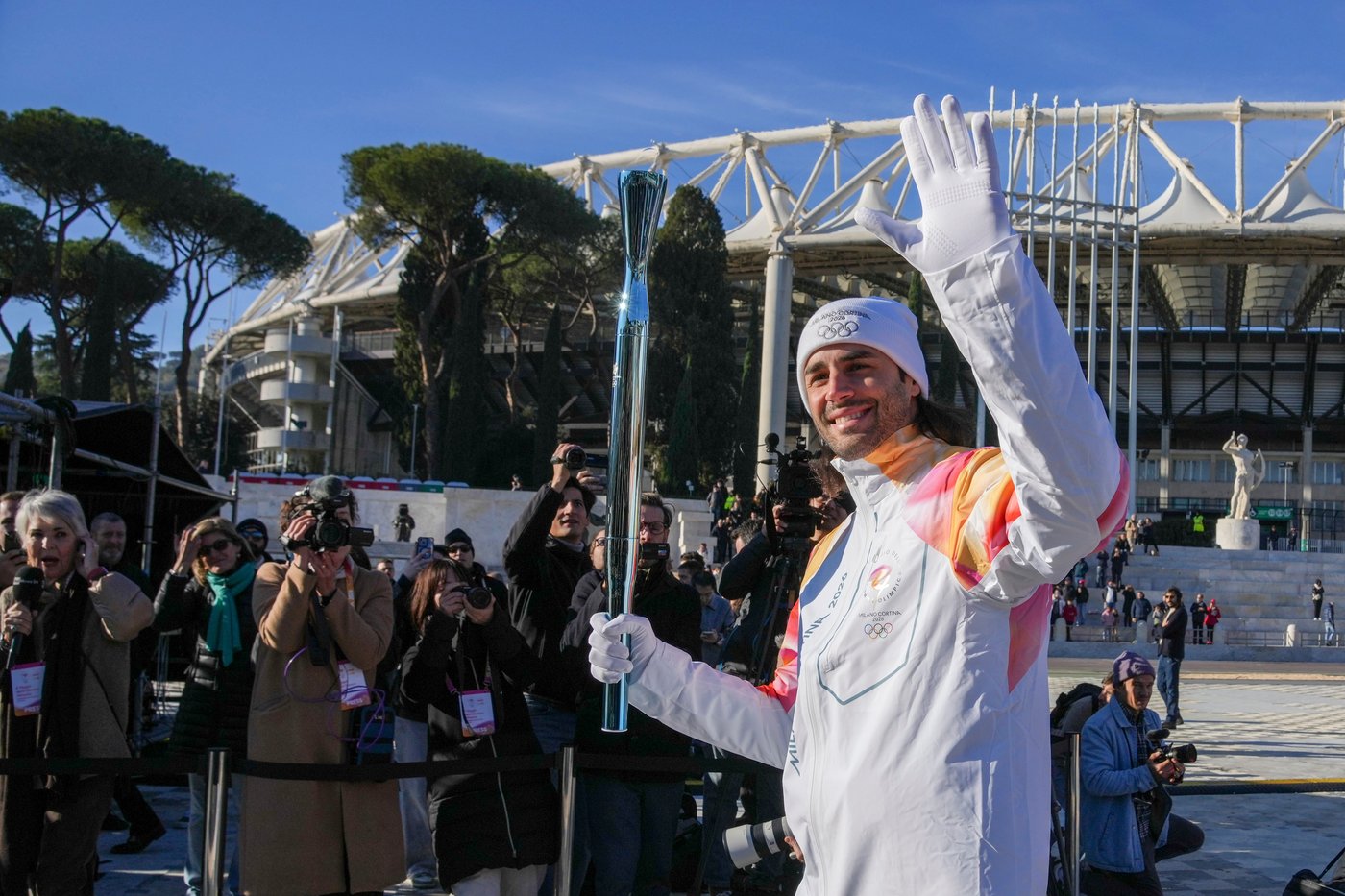 Summer Olympians begin torch relay for Milan Cortina Winter Games on 2-month countdown | iNFOnews.ca