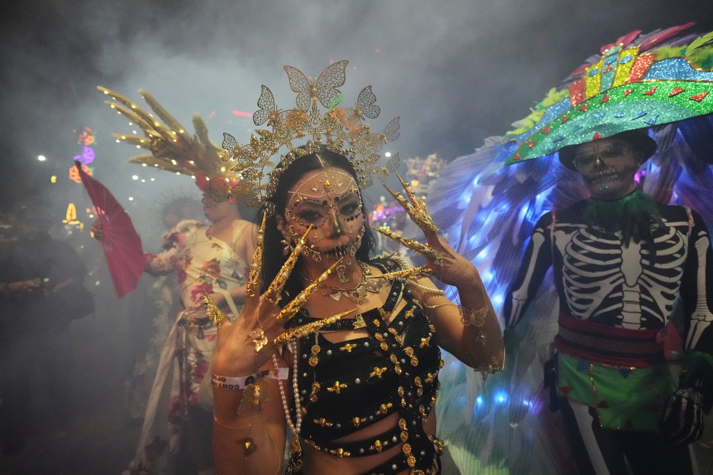 LGBTQ+ artists bring pride to Mexico City's Catrina parade ahead of Day of the Dead, in photos | iNFOnews.ca